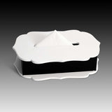 Luxury leather silhouette tissue holder displayed on desk - The Mage Home
