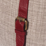 Leather buckle cushion displayed on sofa luxury home decor - The Mage Home