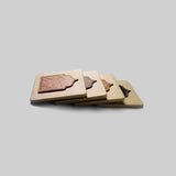 Jharokha coasters set with drinks on coffee table luxury decor - The Mage Home