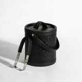Leather ice bucket displayed on bar cart luxury home decor - The Mage Home
